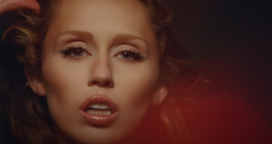 miley-cyrus-something-beautiful.png