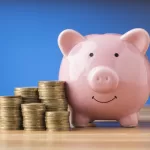 front-view-finance-elements-with-pink-piggy-bank.jpg
